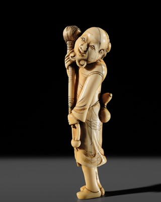 A RARE TALL IVORY NETSUKE OF A BUDDHIST DISCIPLE
