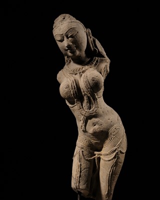 Lot 329 - A SANDSTONE FIGURE OF A CELESTIAL BEAUTY, SURASUNDARI, CENTRAL INDIA, CHANDELA DYNASTY, 10TH-11TH CENTURY
