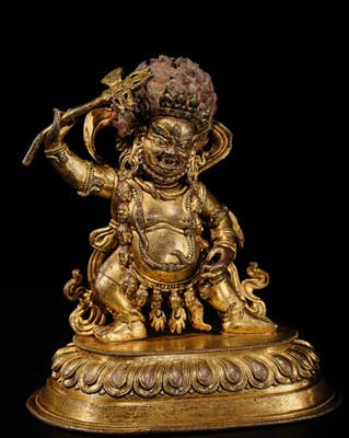 Lot 52 - A GILT-BRONZE FIGURE OF NILAMBARA VAJRAPANI, TIBET, 16TH-17TH CENTURY