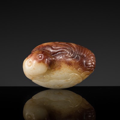 Lot 217 - A WHITE AND RUSSET JADE ‘MYTHICAL BIRD’ PENDANT, MING DYNASTY