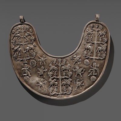 Lot 378 - A RARE SILVER REPOUSSE ‘TREE OF LIFE’ PECTORAL, URARTIAN PERIOD, 8TH-7TH CENTURY BC