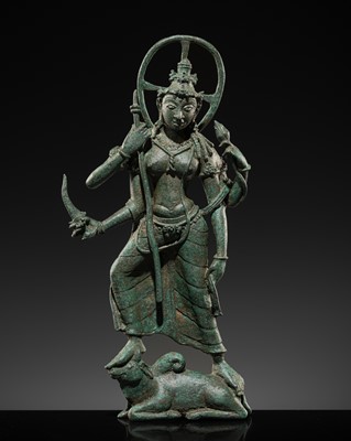 Lot 503 - A RARE BRONZE FIGURE OF DURGA KILLING THE BUFFALO DEMON, CENTRAL JAVA, 9TH-10TH CENTURY