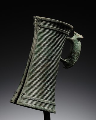 Lot 450 - A PERI-DONGSONIAN ‘ELEPHANT’ CUFF BRACELET, BAN CHIANG, CIRCA 2ND CENTURY BC