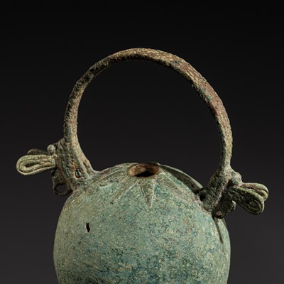 Lot 449 - A BRONZE RITUAL BELL WITH A DRAGONFLY HANDLE, PERI-DONGSONIAN CULTURE, THAILAND, CIRCA 300 BC-200 AD