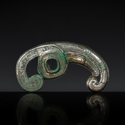 Lot 136 - A BRONZE HORSE BRIDLE CHEEK PIECE, JU, WARRING STATES PERIOD