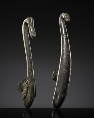 Lot 140 - A GROUP OF TWO BRONZE BELT HOOKS, WARRING STATES PERIOD-HAN DYNASTY