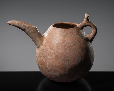 Lot 387 - A TERRACOTTA BEAK-SPOUTED EWER, IRAN, 1500-1000 BC