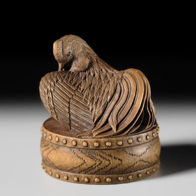 TOMOKAZU: A SUPERB WOOD NETSUKE OF A COCKEREL ON A DRUM