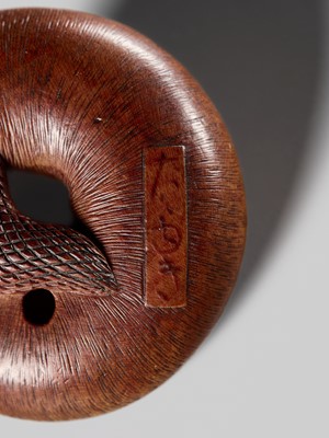 Lot 192 - TADAYUKI: A FINE NAGOYA SCHOOL WOOD NETSUKE OF A SNAIL EMERGING FROM ITS SHELL