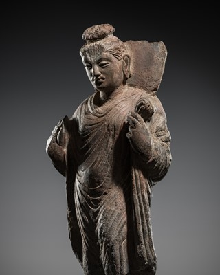 Lot 403 - A GRAY SCHIST FIGURE OF BUDDHA, ANCIENT REGION OF GANDHARA, 3RD-4TH CENTURY