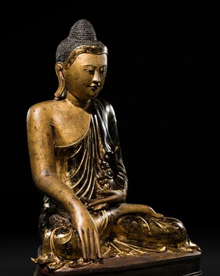 Lot 485 - A LARGE AND IMPRESSIVE GILT-LACQUER BRONZE FIGURE OF BUDDHA SHAKYAMUNI, MANDALAY PERIOD