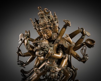 Lot 64 - A LARGE COPPER ALLOY FIGURE OF CHAKRASAMVARA AND VAJRAVARAHI, NEPAL, 18TH-19TH CENTURY