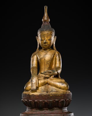 Lot 482 - A GILT-LACQUERED BRONZE FIGURE OF BUDDHA SHAKYAMUNI, SHAN STATES, 17TH-18TH CENTURY