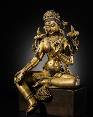 Lot 79 - A GILT-BRONZE FIGURE OF GREEN TARA, NEPAL