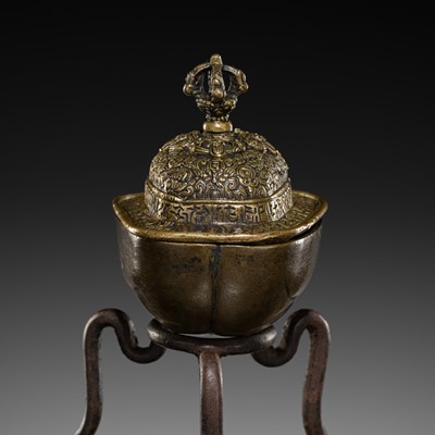 Lot 28 - A COPPER REPOUSSÉ KAPALA AND STAND, TIBET, 18TH-19TH CENTURY