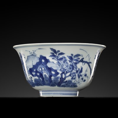 Lot 261 - A BLUE AND WHITE ‘CHRYSANTHEMUM AND CHERRY BLOSSOM’ BOWL, CHANGQING MARK, KANGXI PERIOD