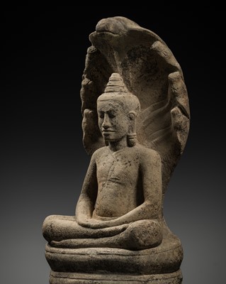 Lot 440 - A SANDSTONE FIGURE OF BUDDHA MUCHALINDA, ANGKOR PERIOD, BAYON STYLE, LATE 12TH-EARLY 13TH CENTURY