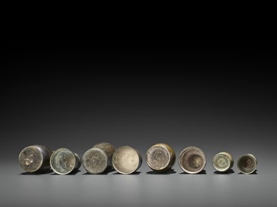 Lot 1305 - FOUR CHAM BRONZE BETEL NUT CONTAINERS