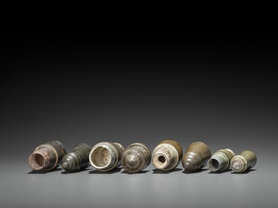 Lot 1305 - FOUR CHAM BRONZE BETEL NUT CONTAINERS