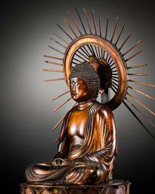 A LARGE (72 CM) AND IMPRESSIVE GILT-LACQUER WOOD FIGURE OF AMIDA NYORAI ON A LOTUS THRONE, 18TH CENTURY