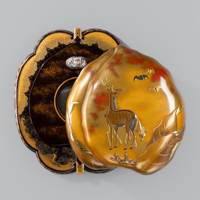 A SUPERB AND UNUSUAL PEACH-SHAPED LACQUER ‘DEER, BATS AND CRANE’ SUZURIBAKO (WRITING BOX)