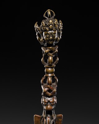 Lot 2 - A LARGE BRASS ALLOY VAJRAKILA PHURBA, TIBET, CIRCA 13TH-14TH CENTURY