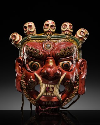 Lot 40 - A POLYCHROME AND GILT-LACQUERED PAPIER-MÂCHÉ ‘SHINJE CHOGYEL’ RITUAL MASK FOR THE CHAM DANCE