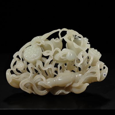 Lot 228 - A SUPERB WHITE JADE RETICULATED ‘EGRETS AND LOTUS’ GROUP, CIRCA 1900