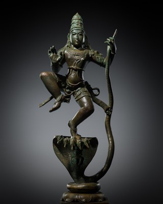 Lot 341 - A LARGE COPPER ALLOY FIGURE OF KRISHNA OVERCOMING THE SERPENT KING KALIYA, 18TH-19TH CENTURY