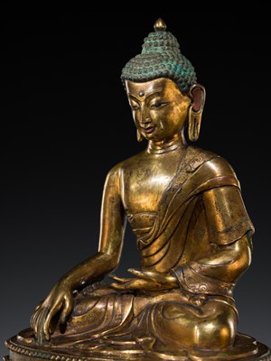 Lot 71 - A GILT-BRONZE OF BUDDHA SHAKYAMUNI, TIBETAN-CHINESE, 19TH-FIRST HALF OF 20TH CENTURY