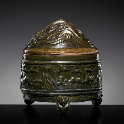 Lot 237 - A GREEN-GLAZED POTTERY 'HILL' TRIPOD JAR AND COVER, LIAN, HAN DYNASTY