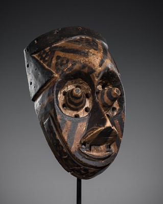 Lot 536 - A KUBA POLYCHROME WOOD RITUAL DANCE MASK, PWOOM ITOK, FIRST HALF OF 20TH CENTURY