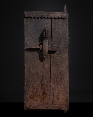 Lot 545 - A RARE AND MASSIVE BAMANA WOOD MILLET GRANARY DOOR, FIRST HALF OF 20TH CENTURY