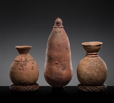 Lot 547 - A GROUP OF TWO TERRACOTTA FUNERARY VESSELS AND A HUMAN FIGURE, PROBABLY BURA CULTURE