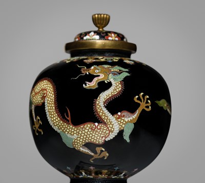 Lot 143 - NAMIKAWA YASUYUKI: A MAGNIFICENT BLACK-GROUND CLOISONNÉ ENAMEL ‘WRITHING DRAGONS’ SPHERICAL JAR AND COVER