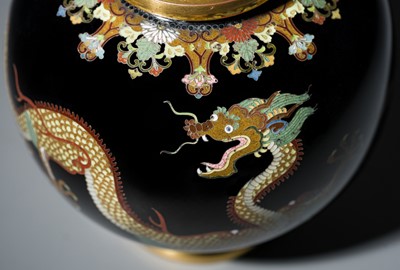 Lot 143 - NAMIKAWA YASUYUKI: A MAGNIFICENT BLACK-GROUND CLOISONNÉ ENAMEL ‘WRITHING DRAGONS’ SPHERICAL JAR AND COVER