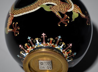 Lot 143 - NAMIKAWA YASUYUKI: A MAGNIFICENT BLACK-GROUND CLOISONNÉ ENAMEL ‘WRITHING DRAGONS’ SPHERICAL JAR AND COVER
