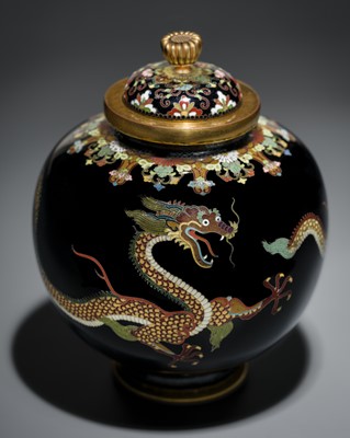 Lot 143 - NAMIKAWA YASUYUKI: A MAGNIFICENT BLACK-GROUND CLOISONNÉ ENAMEL ‘WRITHING DRAGONS’ SPHERICAL JAR AND COVER