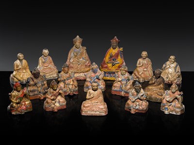 Lot 58 - A GROUP OF SIXTEEN POLYCHROMED LACQUERED CLAY FIGURES, TIBET, CIRCA 18TH CENTURY