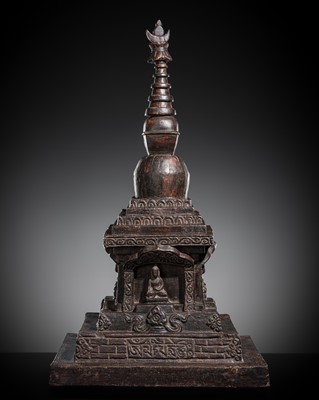 Lot 7 - A LARGE CARVED AND LACQUERED WOOD ‘FOUR BUDDHA’ DIRECTIONAL STUPA, NEPAL, 18TH-19TH CENTURY