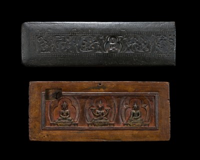 Lot 33 - A GROUP OF TWO CARVED WOOD MANUSCRIPT COVERS, TIBET, CIRCA 12TH-13TH CENTURY