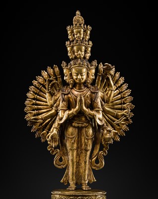 Lot 77 - A GILT COPPER ALLOY FIGURE OF AVALOKITESHVARA SAHASHRABHUJA EKADASHAMUKHA, TIBETAN-CHINESE, EARLY 20TH CENTURY