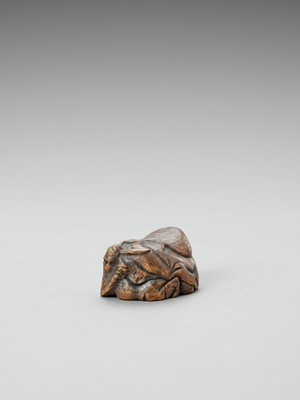 Lot 280 - A WOOD SHUNGA OKIMONO-NETSUKE OF SHOKI AND OKAME