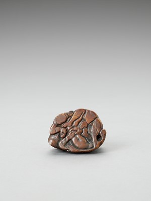 Lot 280 - A WOOD SHUNGA OKIMONO-NETSUKE OF SHOKI AND OKAME