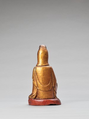 Lot 596 - A POLYCHROME AND GILT-LACQUERED WOOD FIGURE OF GUANYIN, QING