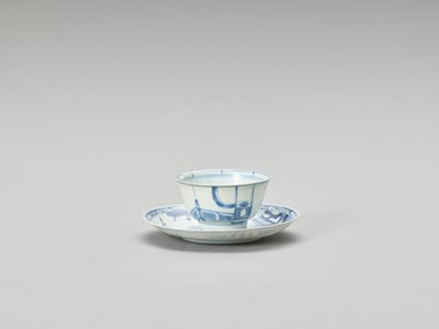Lot 627 - A BLUE AND WHITE PORCELAIN CUP AND SAUCER, MING