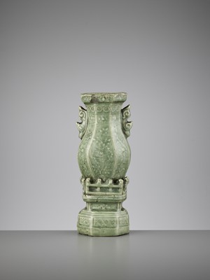 Lot 742 - A CARVED LONGQUAN WALL VASE, MING