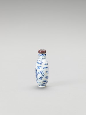 Lot 831 - A BLUE AND WHITE PORCELAIN 'DRAGON' SNUFF BOTTLE