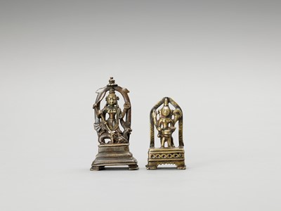 Lot 1252 - TWO INDIAN BRASS FIGURES OF SHIVA AND DURGA