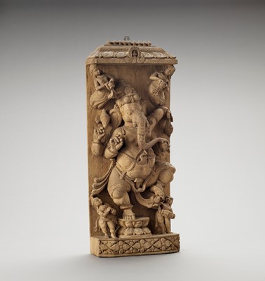 Lot 637 - A CARVED WOOD STELE WITH GANESHA, 20TH CENTURY